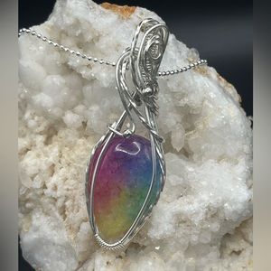 Handcrafted beautiful rainbow solar quartz in sterling silver.